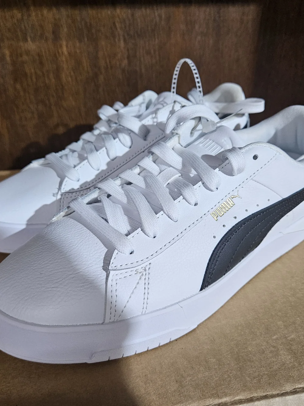 Puma Men’s White Sneakers with Black Formstripe and Gold Logo
